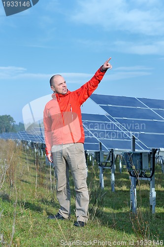 Image of Male solar panel engineer at work place