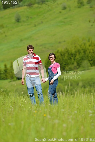 Image of romantic young couple in love together outdoor