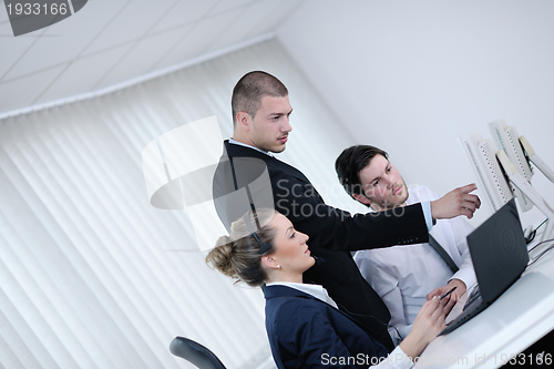 Image of business people group working in customer and help desk office