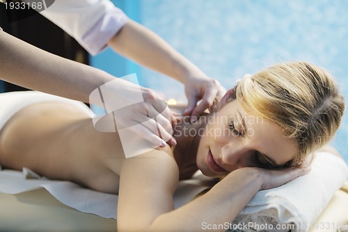 Image of Beautiful young woman in spa