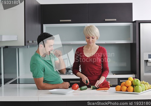 Image of young couple have fun in modern kitchen