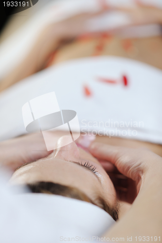 Image of Beautiful young woman in spa