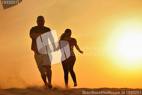 Image of couple enjoying the sunset