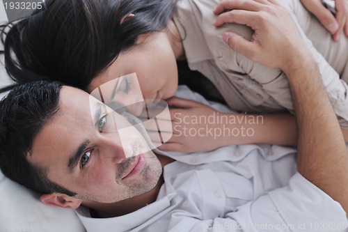 Image of happy young couple relax at home
