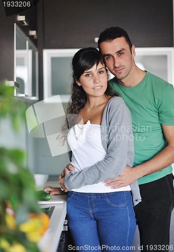 Image of young couple have fun in modern kitchen