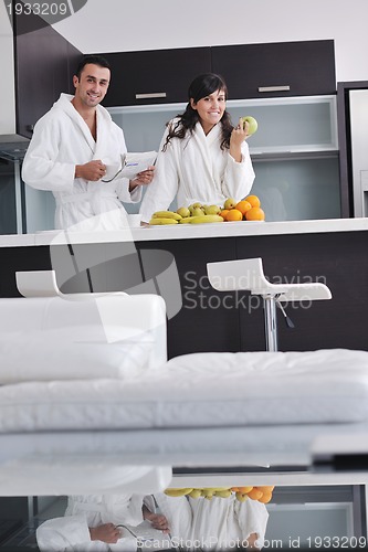 Image of young couple have fun in modern kitchen