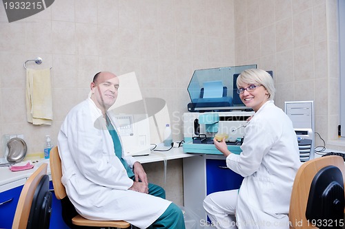 Image of veterinarian and assistant in a small animal clinic