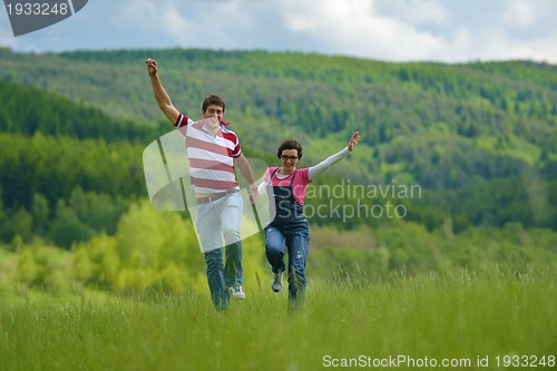Image of romantic young couple in love together outdoor