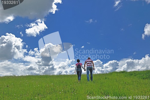 Image of romantic young couple in love together outdoor