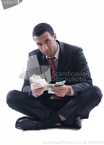Image of Business man holding money