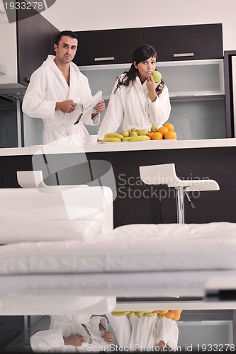 Image of young couple have fun in modern kitchen