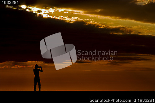 Image of photo of a photographer in the sunset in madagascar