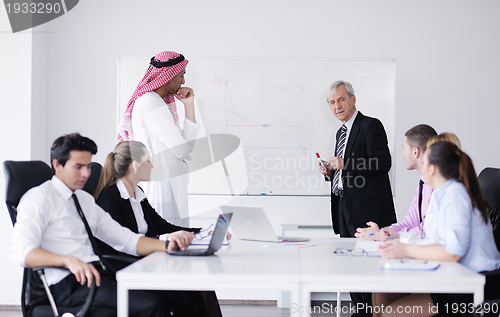 Image of Arabic business man at meeting