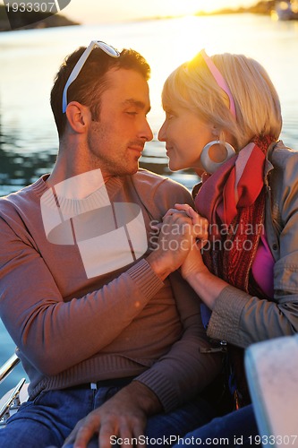 Image of couple in love  have romantic time on boat