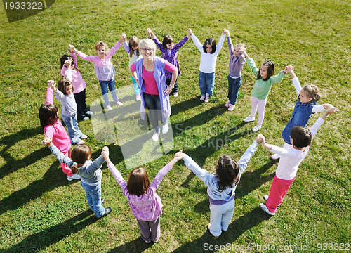 Image of preschool  kids outdoor have fun
