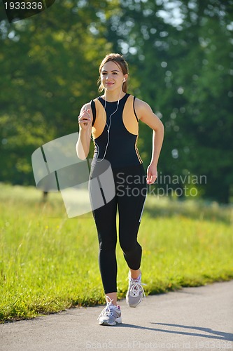 Image of Young couple jogging at morning