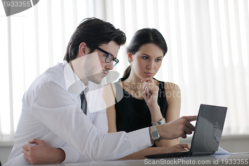 Image of business people in a meeting at office