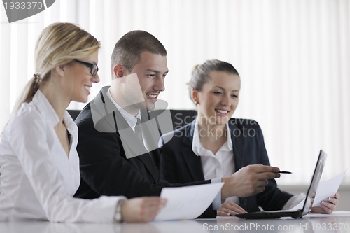 Image of business people in a meeting at office