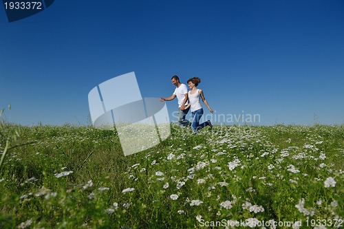 Image of happy couple in wheat field