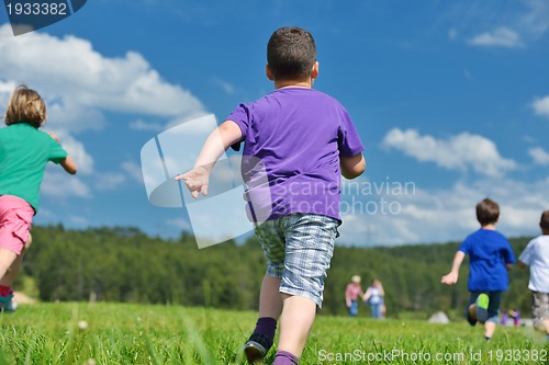 Image of happy kids group  have fun in nature