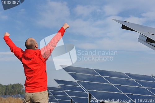 Image of Male solar panel engineer at work place