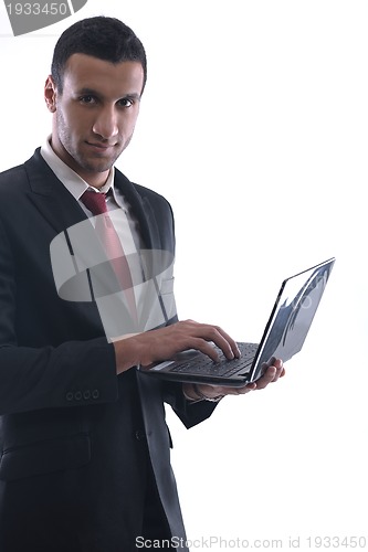 Image of business man work on mini laptop