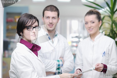 Image of pharmacy drugstore people team