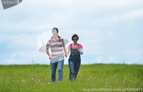 Image of romantic young couple in love together outdoor