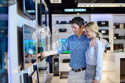 Image of people buy  in consumer electronics store