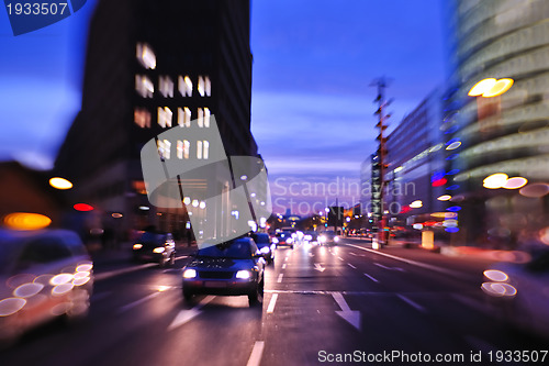 Image of City night with cars motion blurred light in busy street