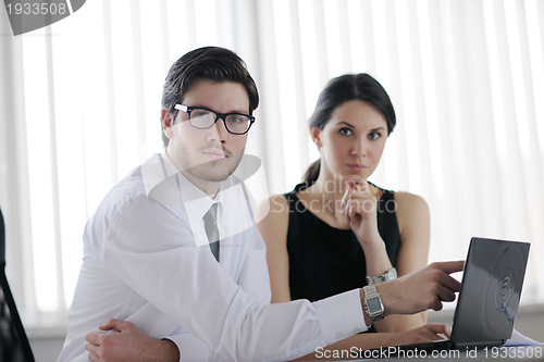 Image of business people in a meeting at office