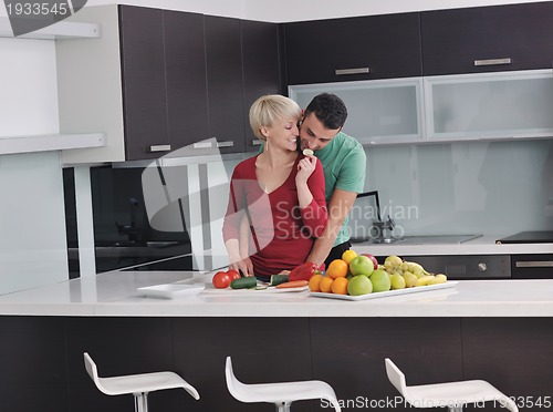 Image of young couple have fun in modern kitchen