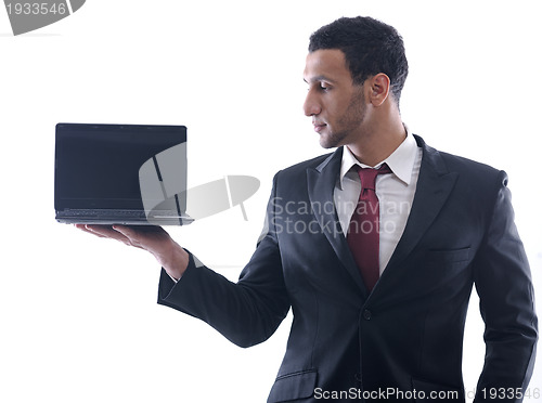 Image of business man work on mini laptop