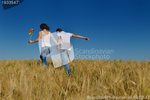 Image of happy couple in wheat field