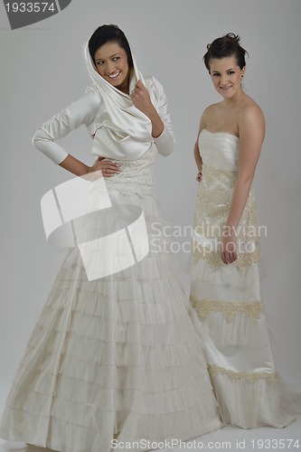 Image of portrait of a three beautiful woman in wedding dress