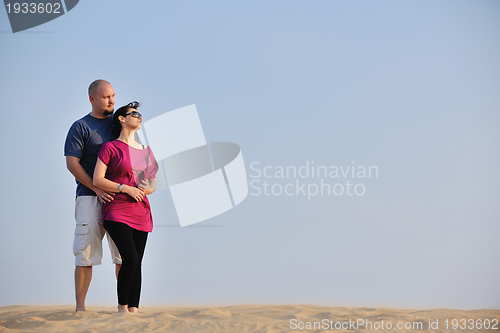 Image of couple enjoying the sunset