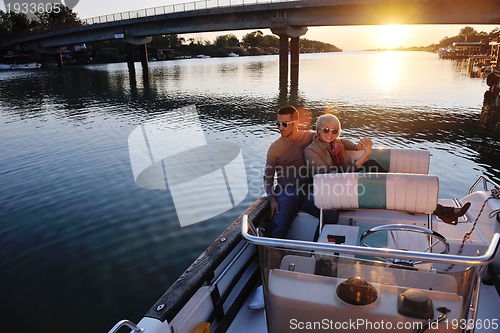 Image of couple in love  have romantic time on boat