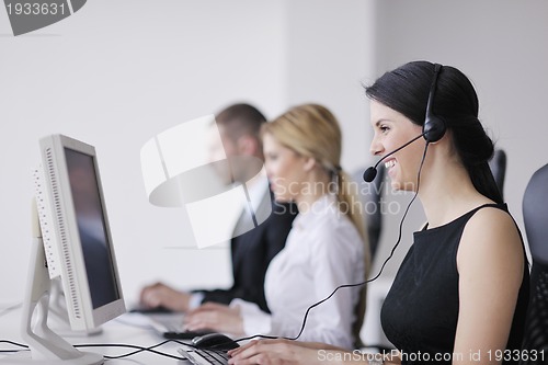 Image of business people group working in customer and help desk office