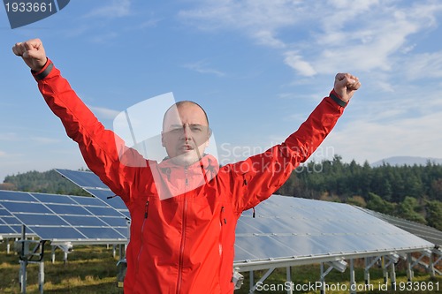 Image of Male solar panel engineer at work place