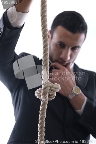 Image of business man with rope isolated on white background