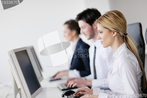 Image of business people group working in customer and help desk office