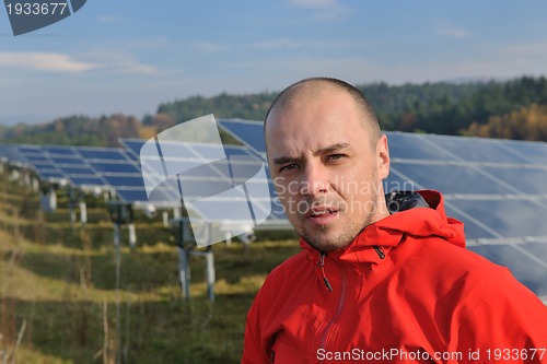 Image of Male solar panel engineer at work place