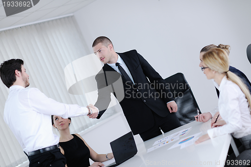 Image of business people in a meeting at office