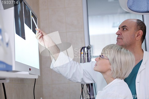 Image of veterinarian and assistant in a small animal clinic
