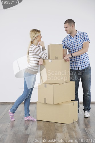 Image of Young couple moving in new home