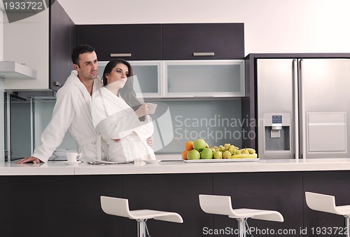 Image of young couple have fun in modern kitchen