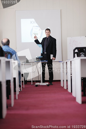 Image of business man on seminar