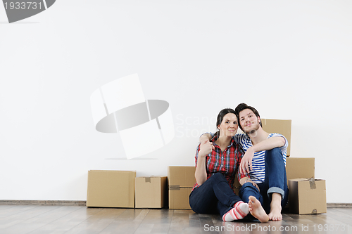 Image of Young couple moving in new house