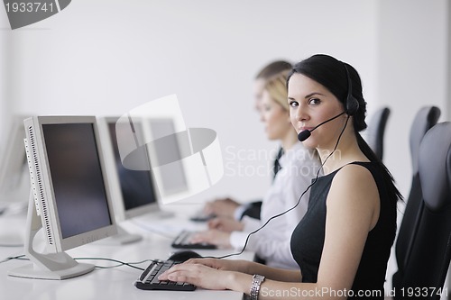 Image of business people group working in customer and help desk office