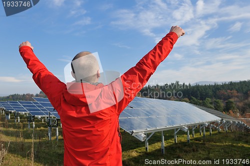 Image of Male solar panel engineer at work place